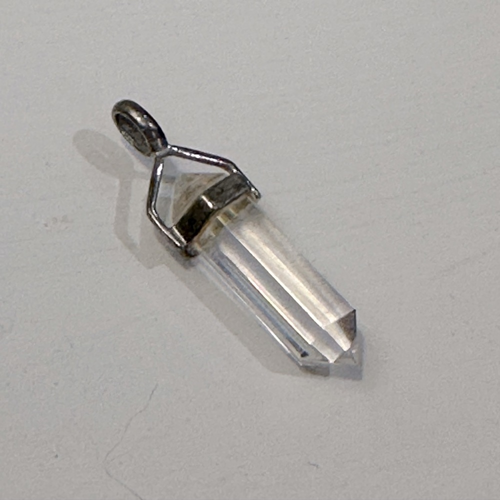 Clear quartz and silver pendant